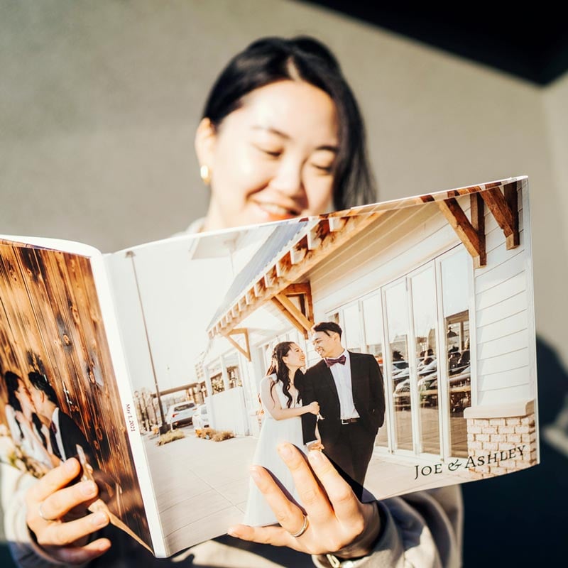 Wedding photo book showing a couple on their wedding day